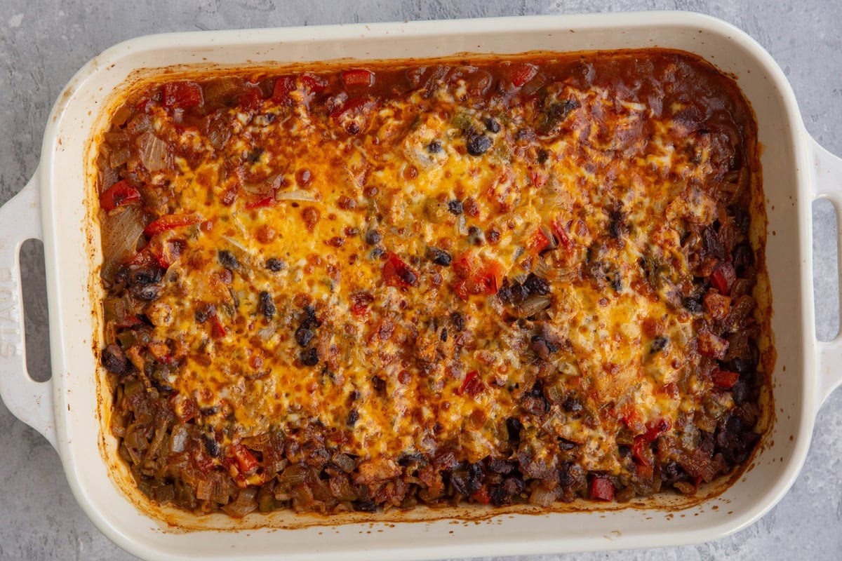 Chicken taco casserole fresh out of the oven with bubbly cheese.