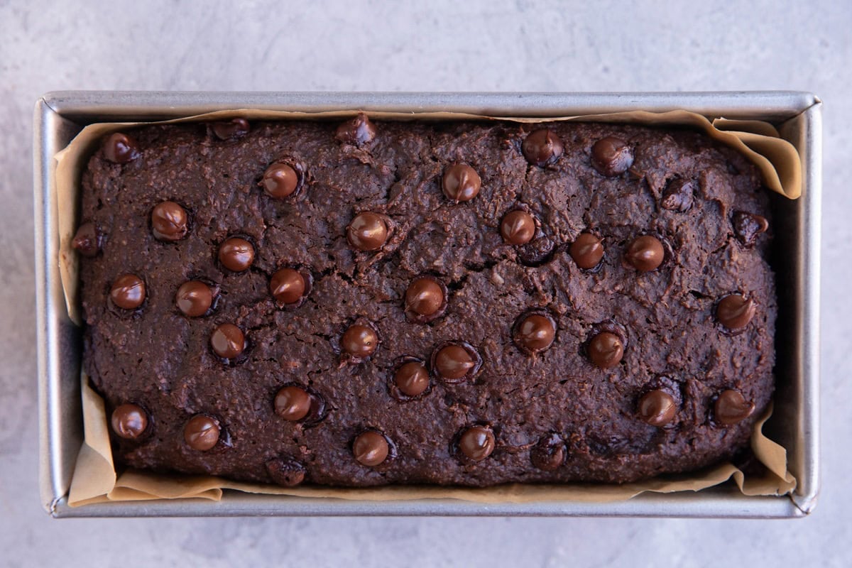 Loaf pan of chocolate sweet potato bread fresh out of the oven.