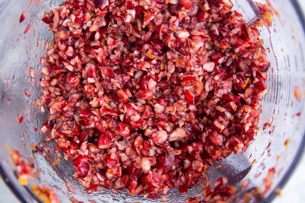 Food processor full of cranberry relish.