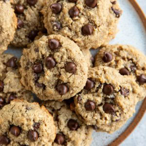 Large plate of oatmeal almond flour cookies with chocolate chips, ready to serve.