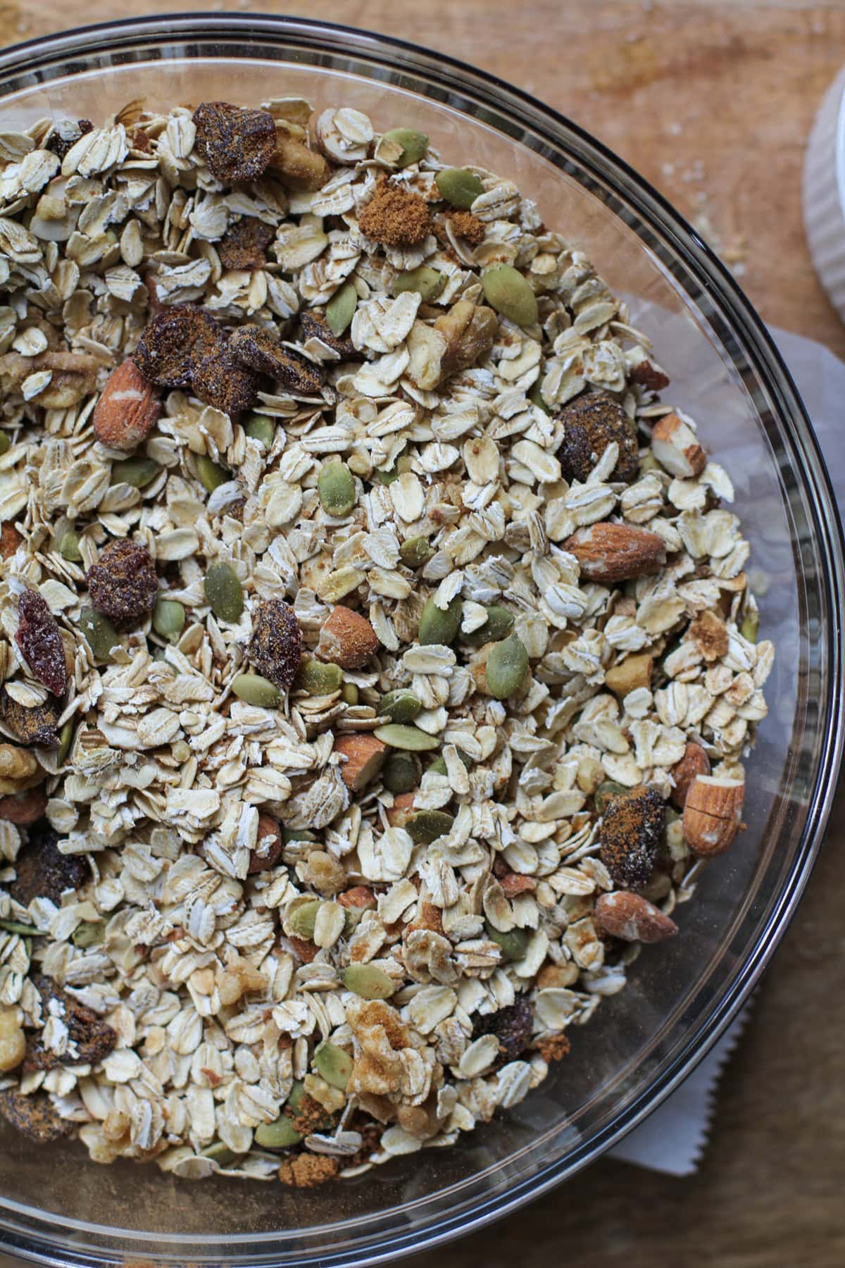 Dry ingredients for granola in a large mixing bowl.