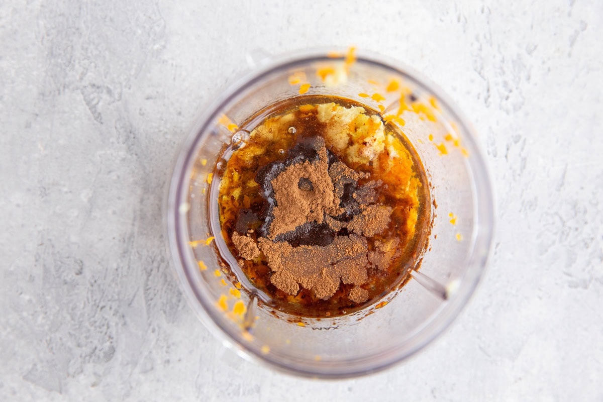 Orange ginger dressing ingredients in a small blender to be mixed up.