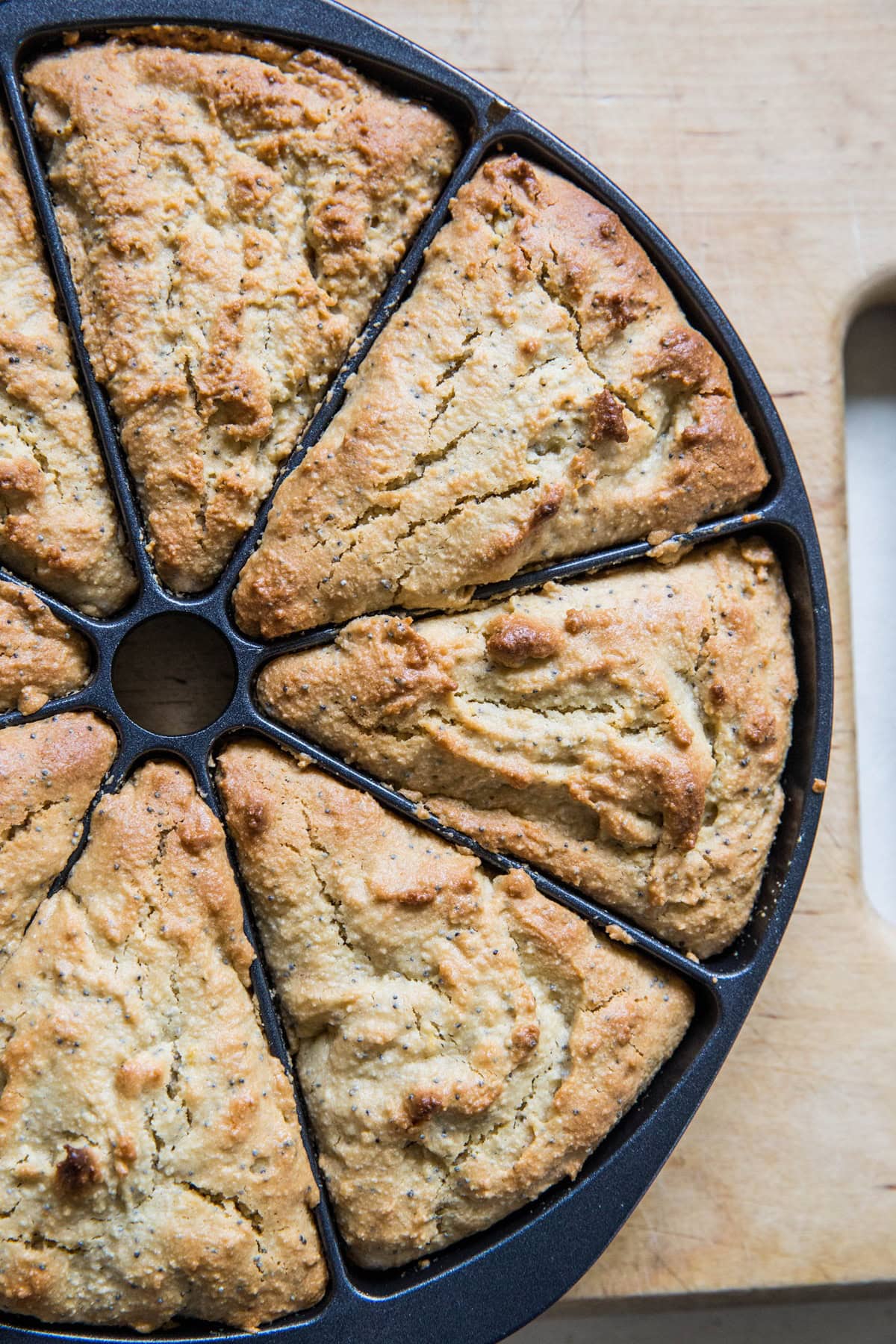 LEMON poppy seed scones in a scone pan, fresh out of the oven.