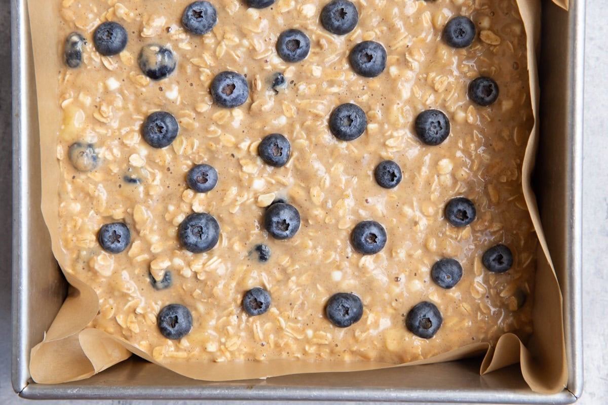 Baking dish with blueberry breakfast bake mixture inside, ready to go into the oven.