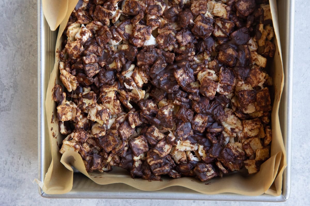 Pan with no-bake s'mores bars inside, ready to be cut and served.