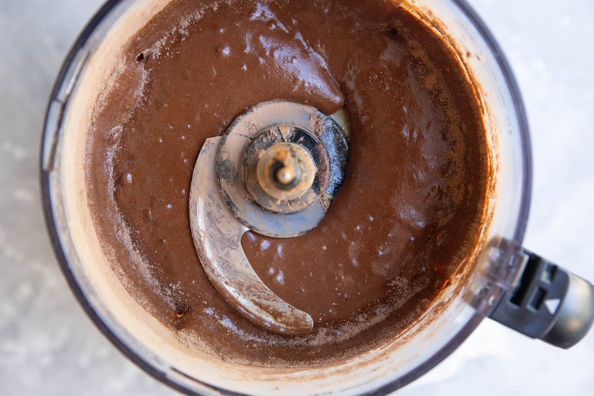 Chocolate cake batter in a food processor, ready to bake.